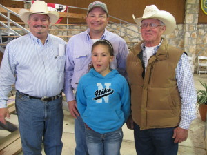 Volume buyer Larry Franke and his daughter of Karnes City, TX with Sale Chaiman, Joe Dillard (left) and TBBA President, Russ Williamson (right).